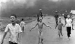 Vietnamese Children Fleeing Their Village